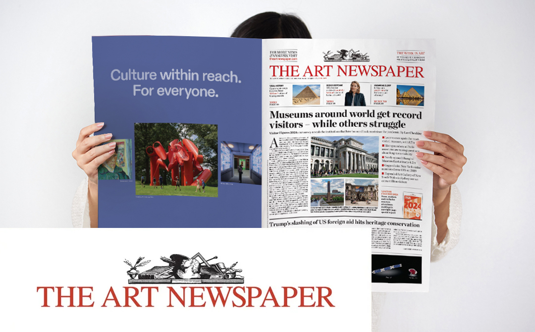 A person holding an open copy of The Art Newspaper from April 2025. The front page features the headline 'Museums around world get record visitors - while others struggle' with several images of museums including what appears to be the exterior of a classical museum building. The left page displays a colorful Picasso-style portrait of a woman with a blue beret and geometric features. The bottom of the image shows The Art Newspaper logo. This publication contains an article about Ronati Studio, a new software platform helping antique dealers manage inventory from acquisition to resale, described as the first comprehensive tool for the antiques industry that addresses the unique inventory management needs of dealers handling pre-owned art and artifacts.