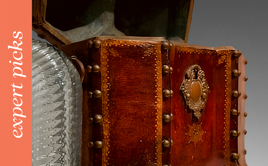 Close-up of an 18th-century Italian leather wine portabottiglie with gilt decoration and original glass bottles, featured in Ronati’s AADLA x NAADA 12 Days of Christmas expert picks